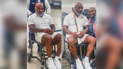 Боксе Майк Тайсон замечен в аэропорту Майами в инвалидной коляске
